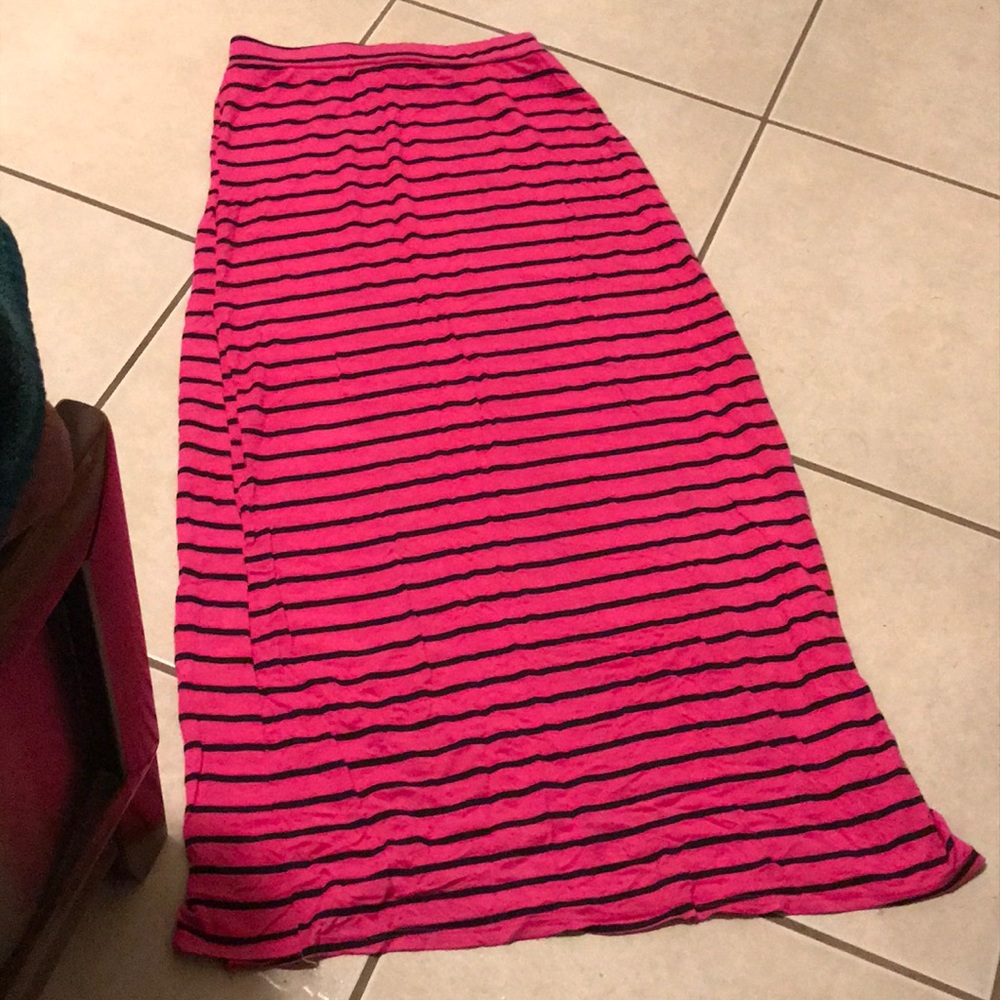 A very long stripped skirt